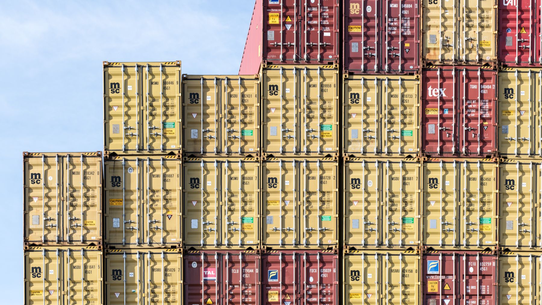 Stacked export containers at the port