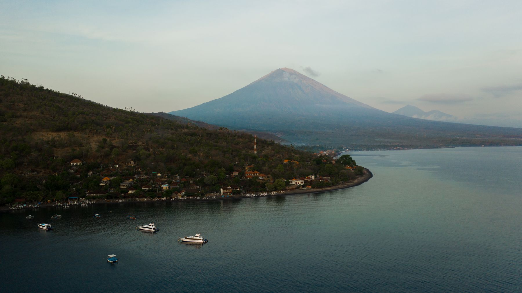 Mount Agung above the East Bali coastline at sunrise