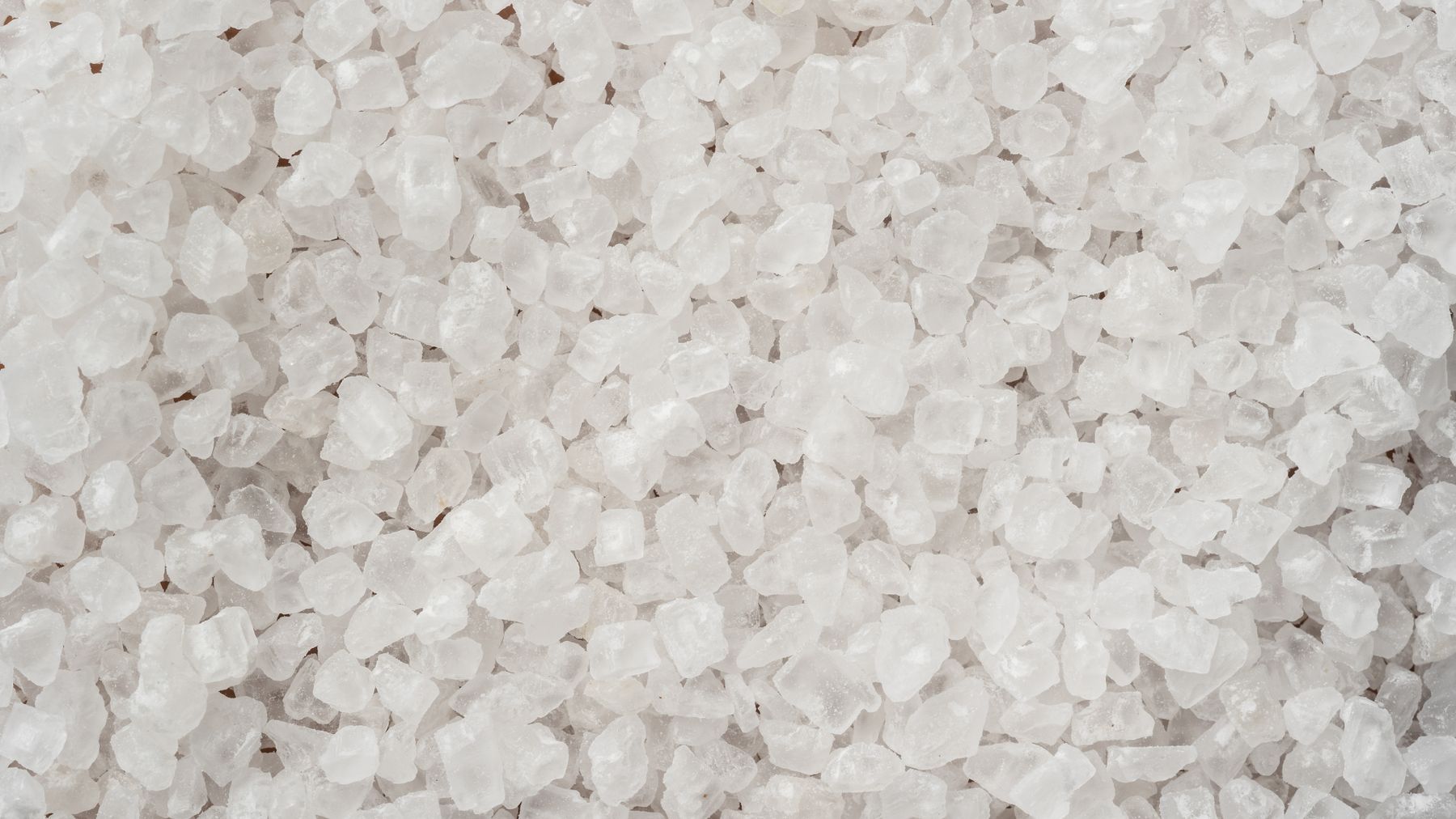Coarse white fleur de sel crystals, close up