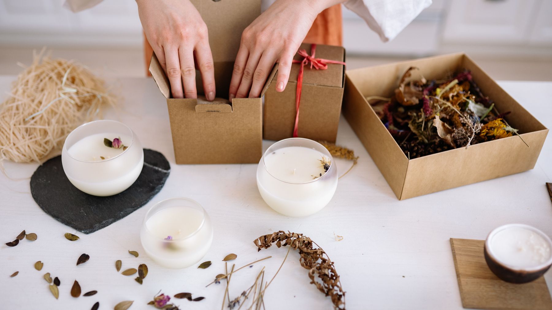 Hand-packed gift boxes with dried botanicals